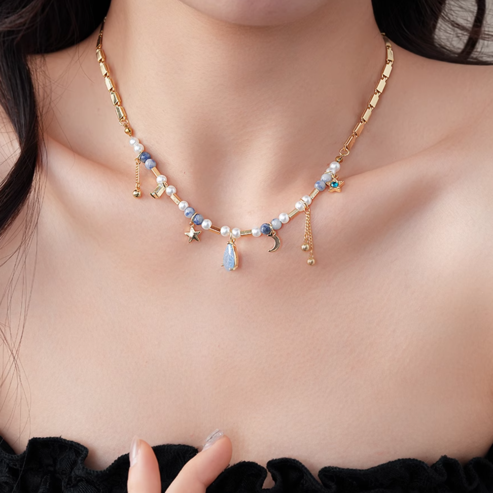 Celestial Pearl Necklace – Moon, Star & Teardrop Pendant
